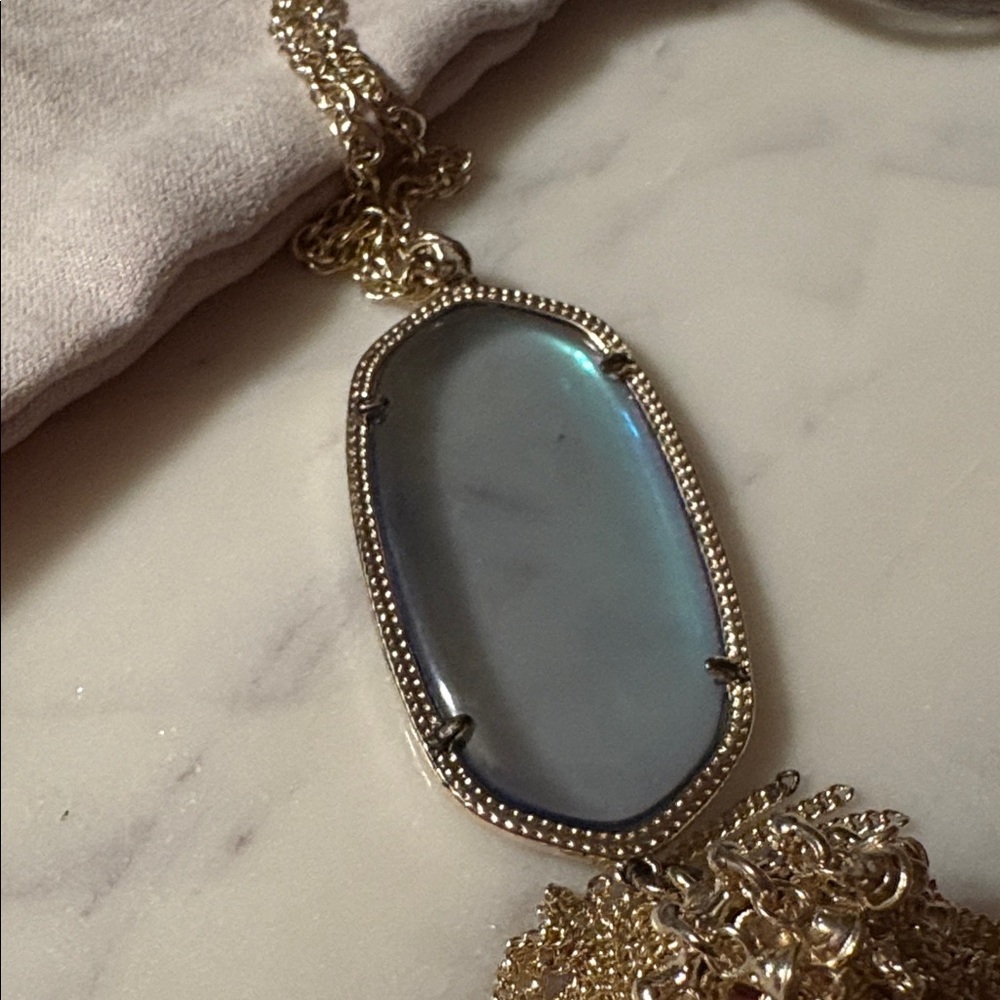Kendra Scott Rayne necklace with gold chain and an iridescent stone with tassel - Picture 2 of 3